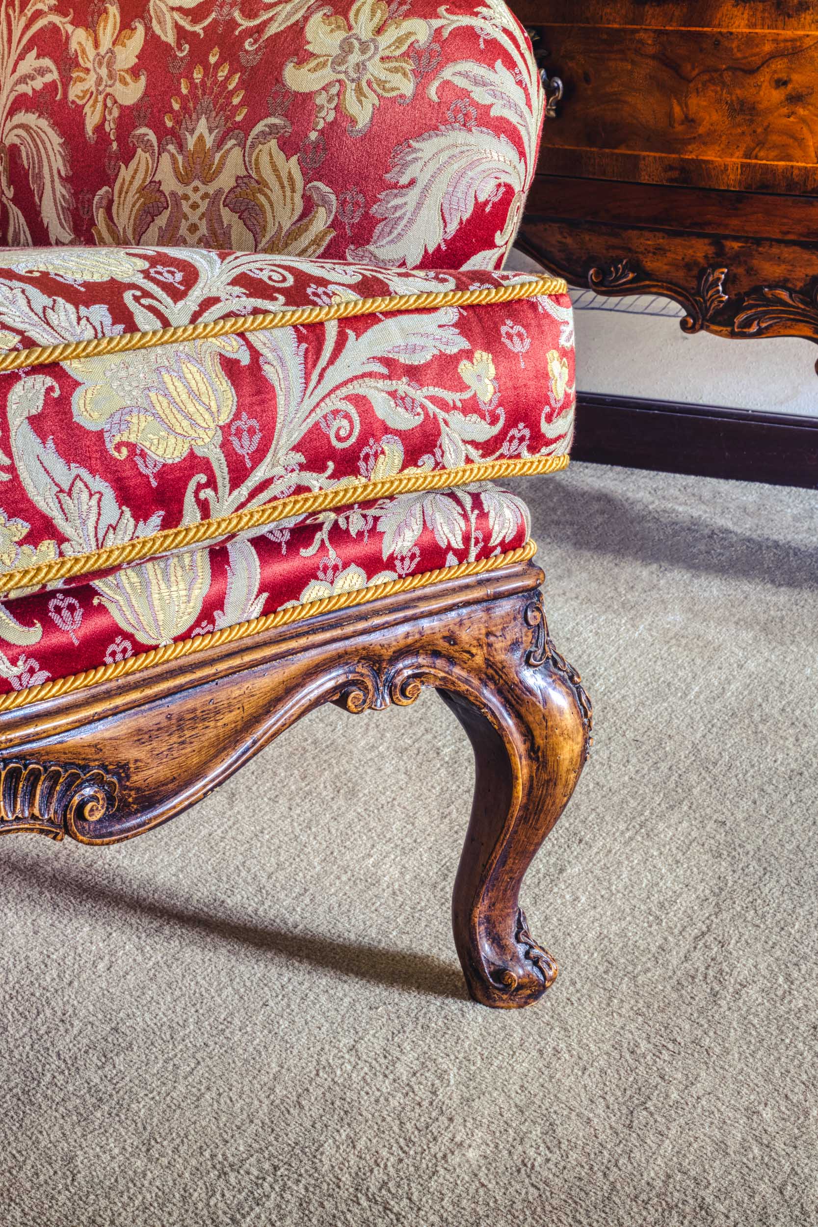 Detail of a vibrant red chair in the Bussandri Villa