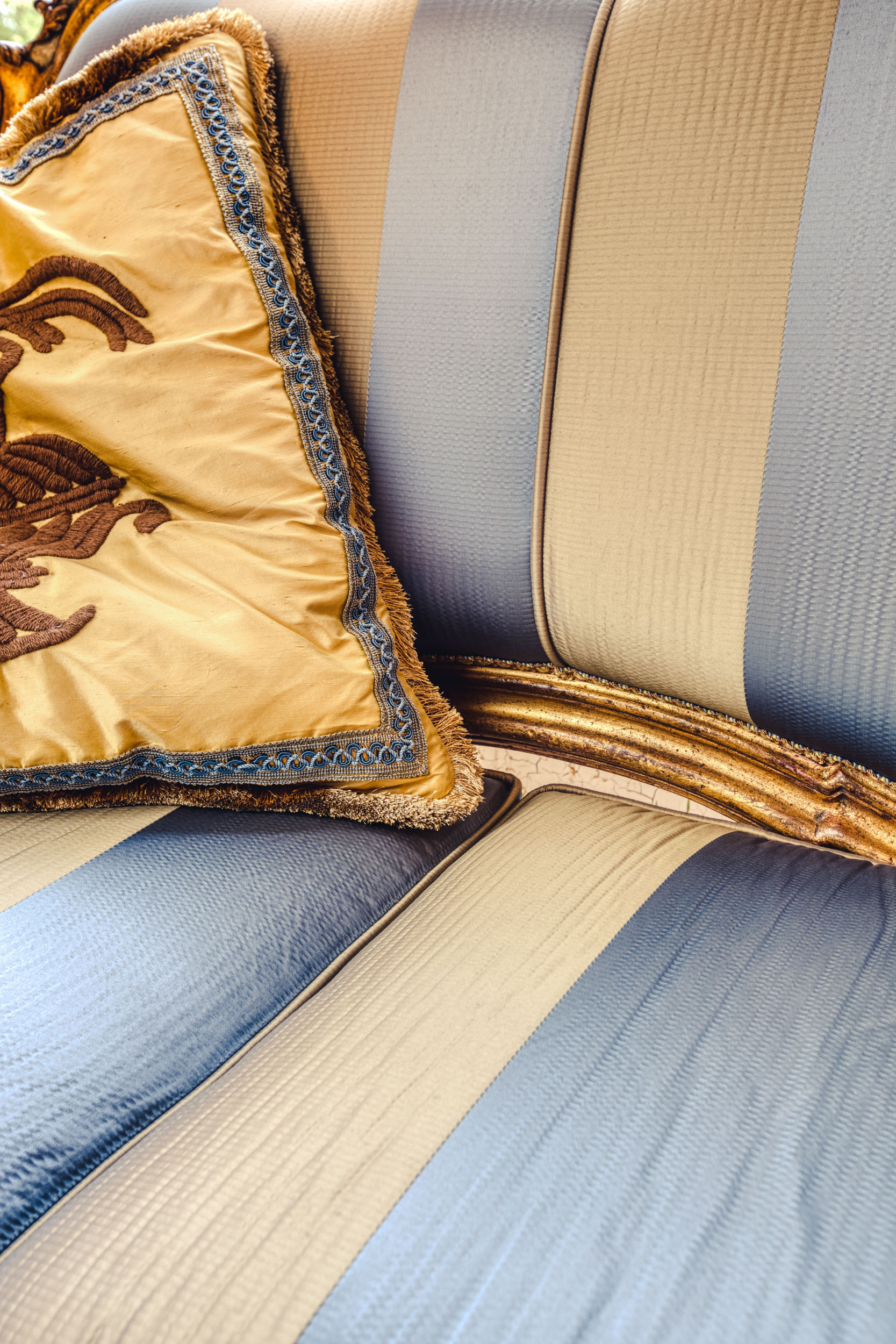 Detail of a blue and white sofa in the Bussandri Villa