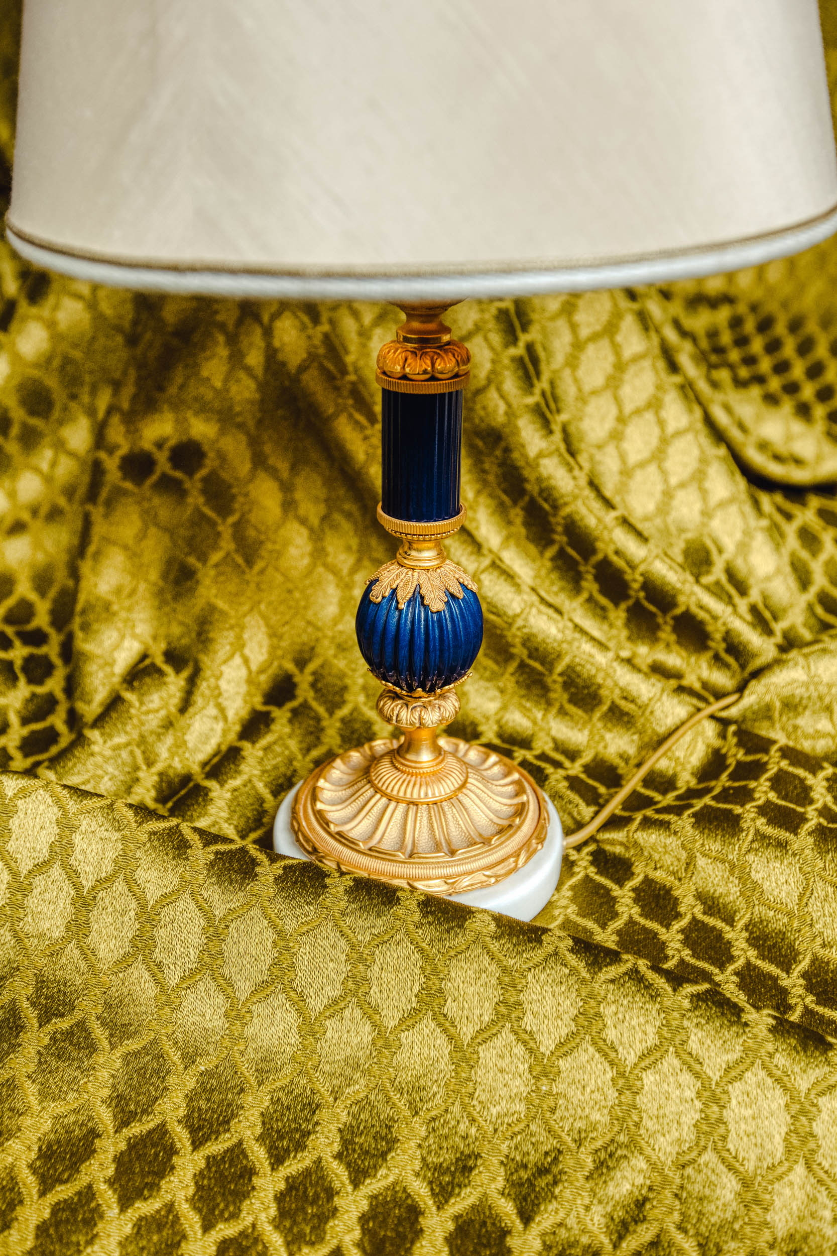 An antique blue white and gold lamp in the Bussandri villa