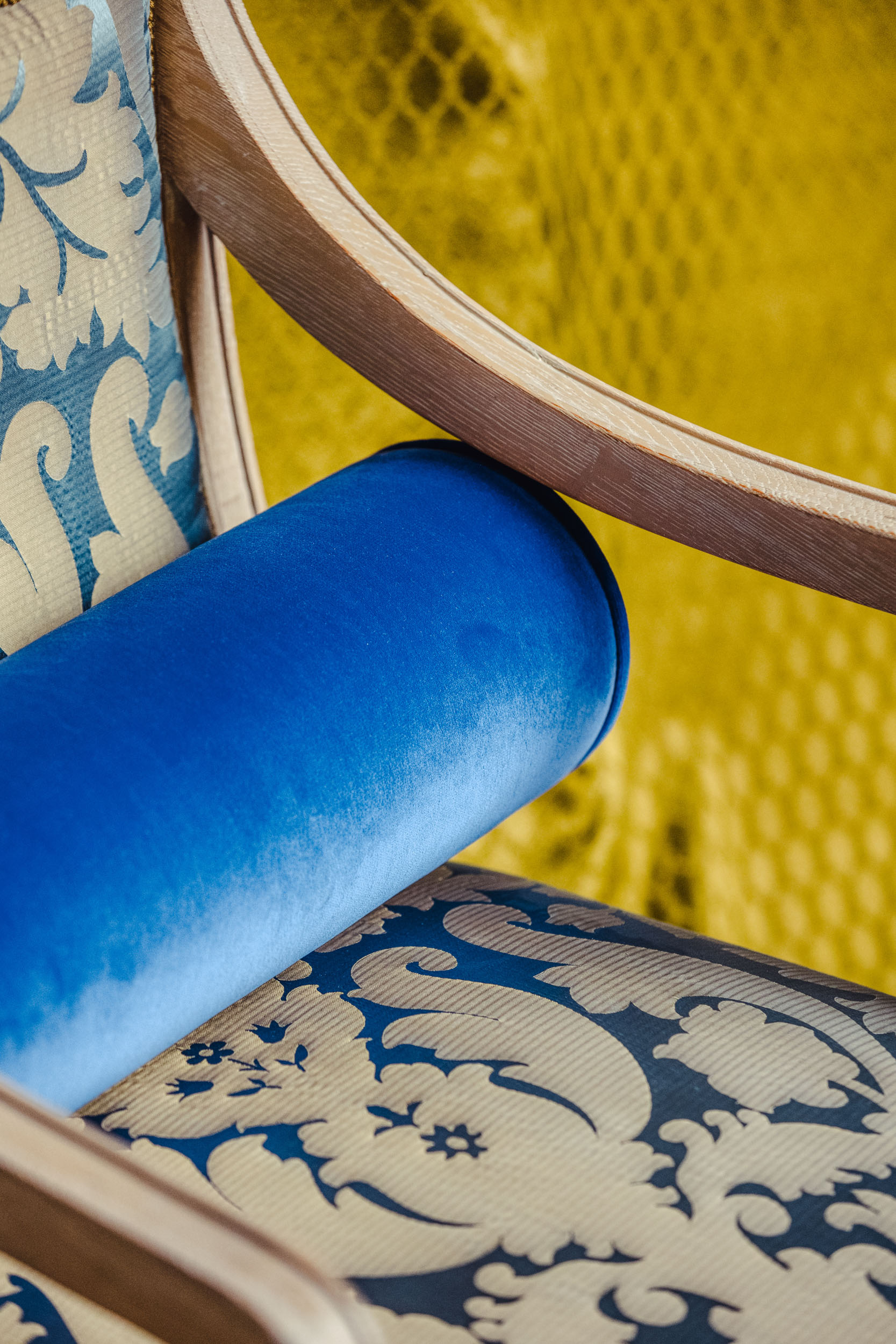 A blue chair in the Bussandri Villa