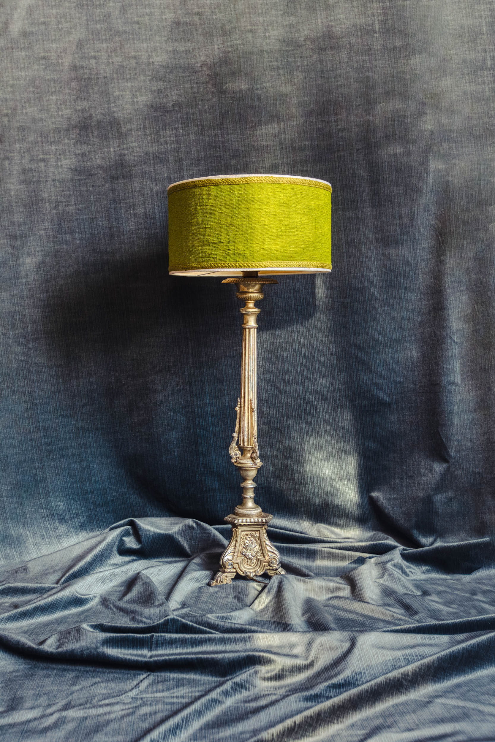 An antique silver and green lamp in the Bussandri villa